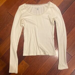 White long sleeve with laced neck line!
